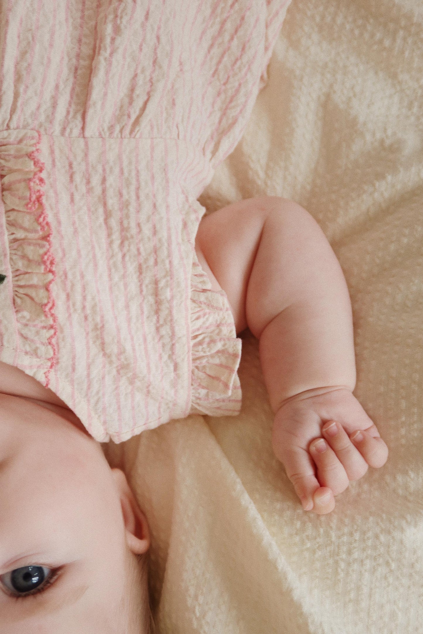 ELLIE FRILL ROMPER