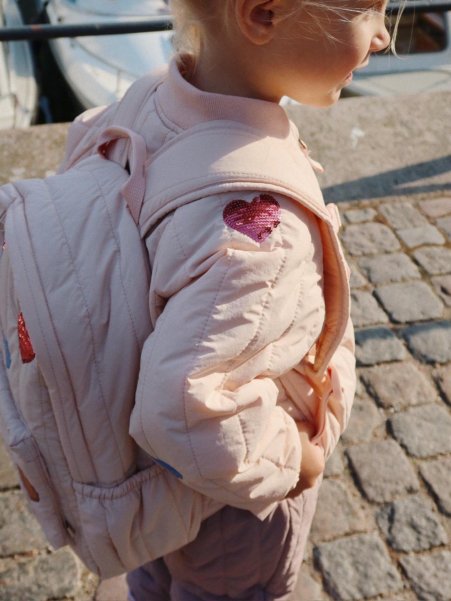 JUNO QUILTED SEQUIN BACKPACK MIDI