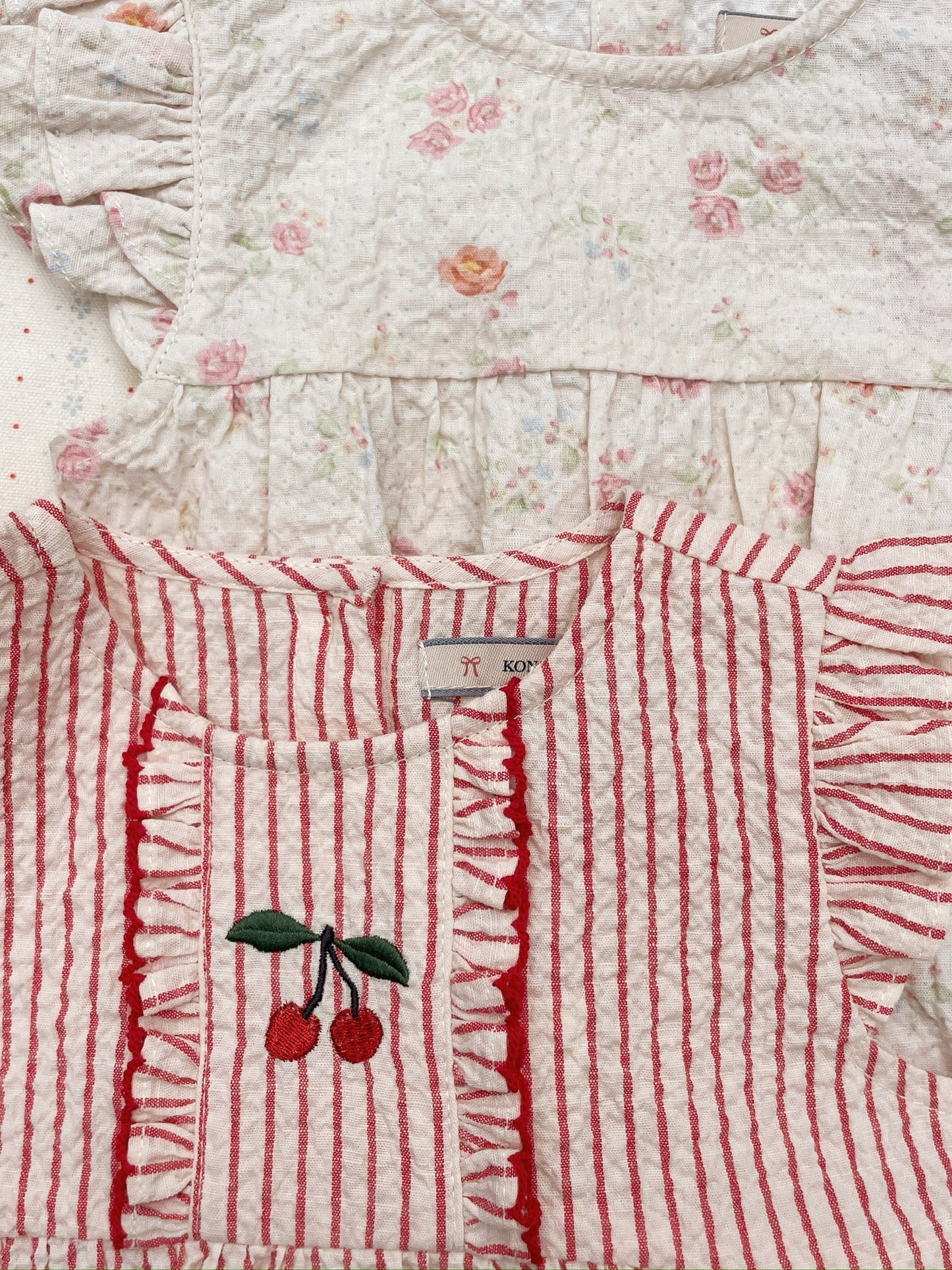 ELLIE FRILL ROMPER