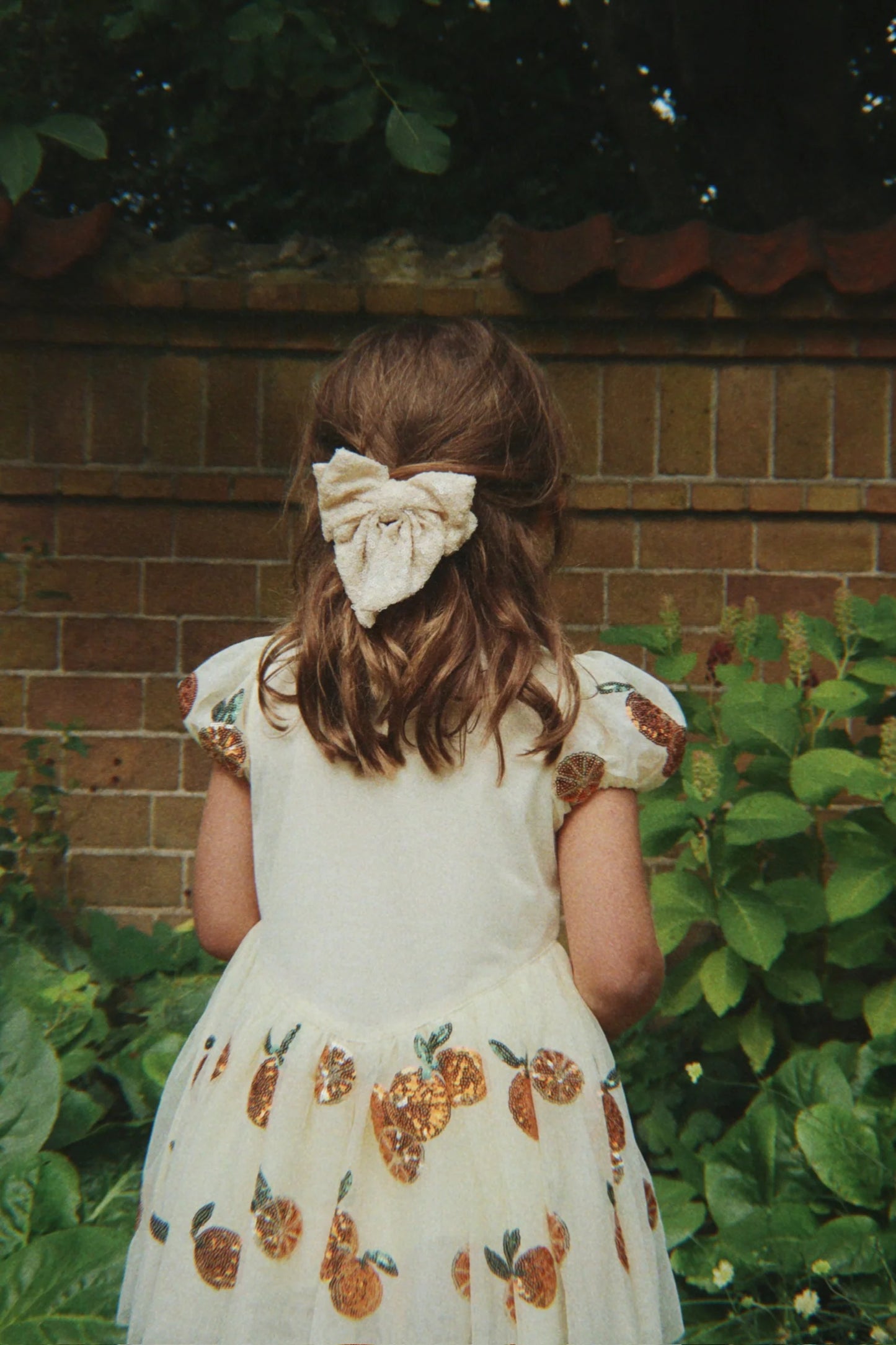 ARIES SEQUIN BOW HAIR CLIP