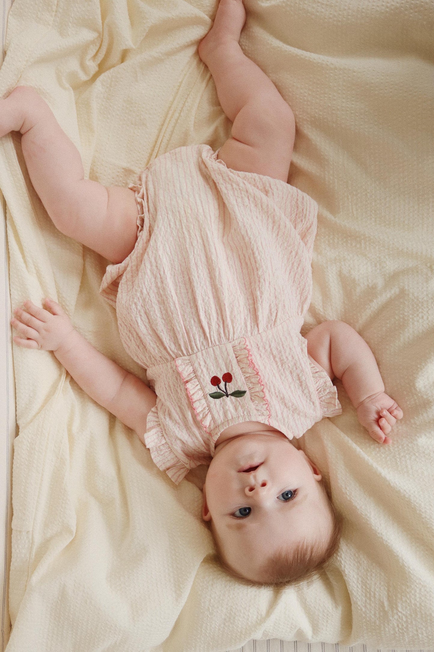 ELLIE FRILL ROMPER